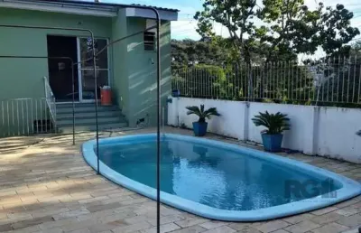 Casa com 3 quartos à venda na Rua Acesso Dos Hibiscos, 218, Santa Tereza, Porto Alegre