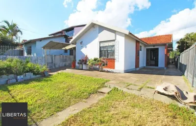 Casa com 5 quartos à venda na Rua João Mora, 258, Camaquã, Porto Alegre
