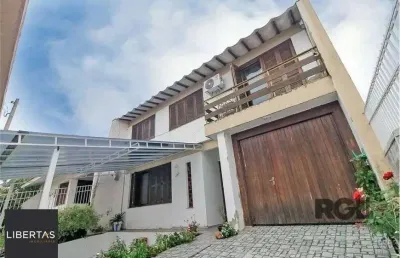 Casa de 285m² - 4 dormitórios, 4 vagas no bairro bom jesus