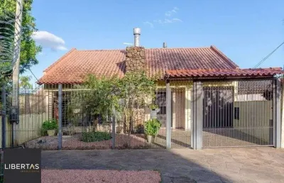 Casa com 3 quartos à venda na Rua Atlântida, 289, Ipanema, Porto Alegre