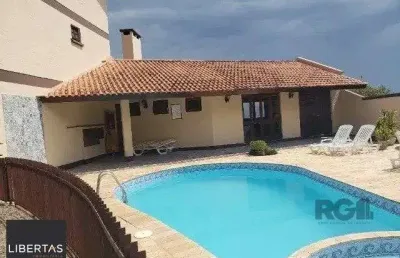 Casa em condominio fechado com 02 dormitórios sendo 01 suite porto alegre/rs