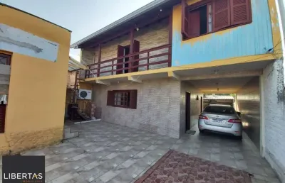 Casa com 3 quartos à venda na Rua Império, 130, Vila Nova, Porto Alegre