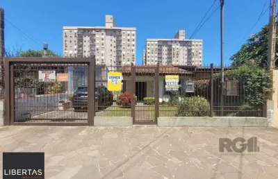 Casa com 4 quartos à venda na Rua Teotônia, 313, Camaquã, Porto Alegre