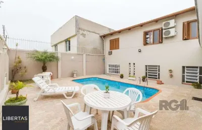 Casa com 4 quartos à venda na Avenida da Serraria, 742, Espírito Santo, Porto Alegre