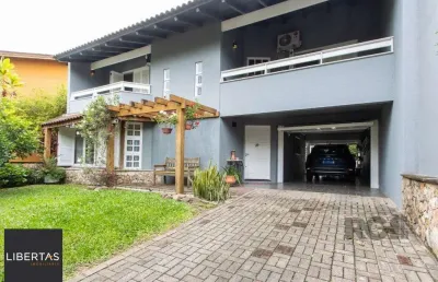 Casa com 4 quartos à venda na Rua Adão Pinheiro da Silva, 565, Ipanema, Porto Alegre