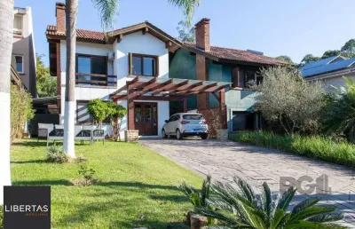 Casa em condomínio 4 dormitórios à venda belém novo porto alegre/rs