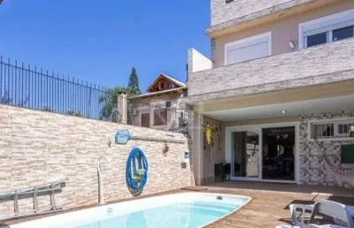 Casa com 3 quartos à venda na Rua Pasteur, 639, Ipanema, Porto Alegre