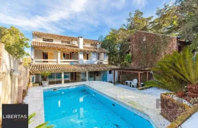 Casa com 3 quartos à venda na Rua Alcebíades Antônio dos Santos, 178, Nonoai, Porto Alegre