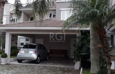 Casa em condomínio fechado, às margens do rio guaíba,