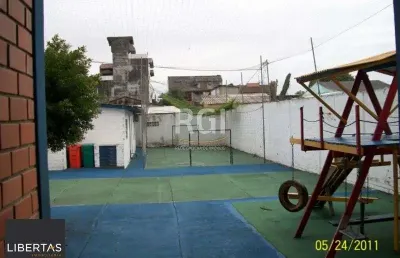 Prédio à venda na Rua Doutor Mário Totta, 2396, Camaquã, Porto Alegre