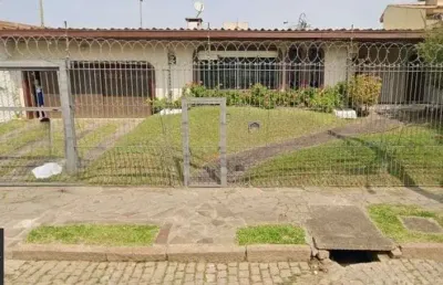 Casa com 4 quartos à venda na Rua Jacipuia, 201, Guarujá, Porto Alegre