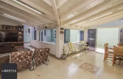 Casa com piscina e 4 suítes no bairro vila ipiranga