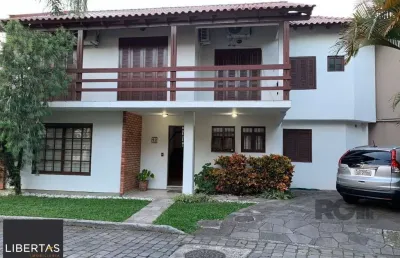 Casa 03 dormitórios condomínio fechado bairro jardim isabel