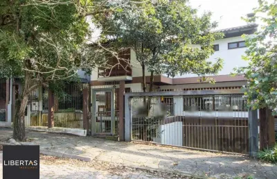 Casa para venda - 361.95m², 4 dormitórios, sendo 2 suites, 3 vagas - nonoai