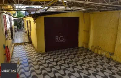 Casa com 5 quartos à venda na Rua Primeiro de Maio, 397, Partenon, Porto Alegre