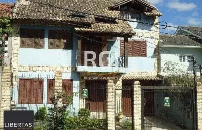Casa à venda – 320m², 3 dormitórios (1 suíte), 5 vagas – partenon