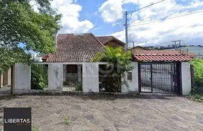 Casa com 3 quartos à venda na Rua Cangussu, 587, Nonoai, Porto Alegre