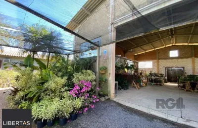 Barracão / Galpão / Depósito à venda na Avenida Ignês E. Fagundes, 441, Restinga, Porto Alegre