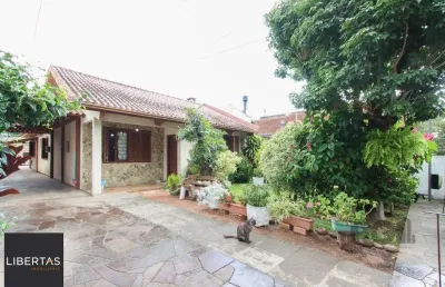 Casa com 4 quartos à venda na Rua Doutor Barcelos, 775, Tristeza, Porto Alegre