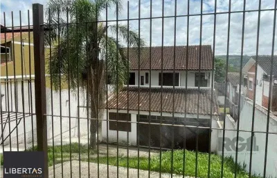 Casa com 3 quartos à venda na Rua Lloyd de Andrade Polidoro, 106, Ipanema, Porto Alegre