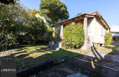 Casa de alvenaria com 104,37m² 3 dormitórios sendo 1 suíte, 2 vagas cobertas