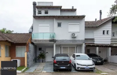 Casa em condomínio 4 dormitórios à venda vila nova porto alegre/rs