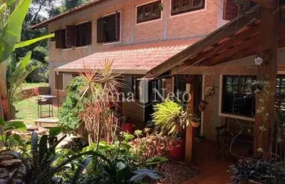 Casa em condomínio com 611 m²,6 quartos,5 suites,8 banheiros,4 vagas