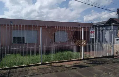 Casa de alvenaria localizada rua pandiá calógeras bairro niterói canoas-rs