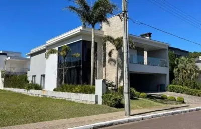 Sobrado duplex no condomínio velas da marina capão da canoa -rs