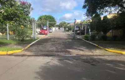 Casa em condomínio 3 dormitórios condomínio vivendas de  malaga canoas rs