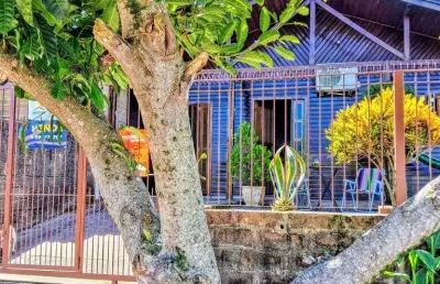 Casa de madeira com 3 dormitórios rua frei galvão bairro auxiliadora gravataí rs