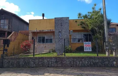 Casa de alvenaria 3 dormitórios rua xingu bairro igara canoas rs.