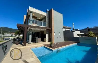 Condomínio caledônia - casa com 3 suítes e 4 vagas no caledônia em camboriú