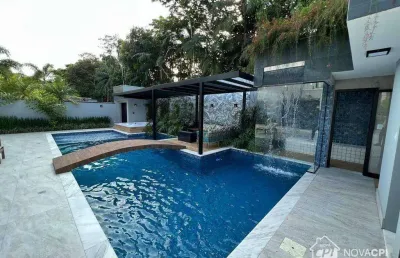 Casa à venda, 417 m² por r$ 9.500.000,00 - riviera - bertioga/sp