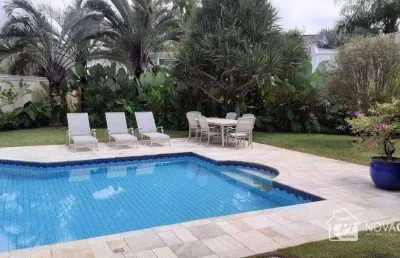 Sobrado a venda no condomínio jardim acapulco - guaruja