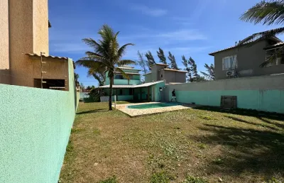 Linda casa de 3 quartos no condominio long beach de frente para praia
