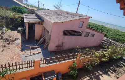 Loja comercial de frente para a praia com excelente terreno!!