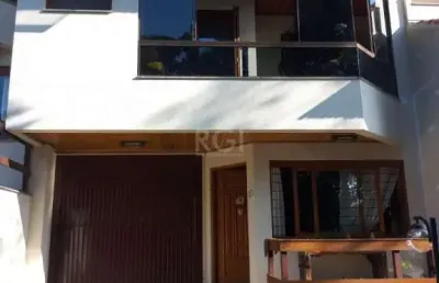 Casa em condomínio fechado com 3 quartos à venda na Rua Alcebíades Antônio dos Santos, Nonoai, Porto Alegre