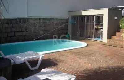 Casa com 4 quartos à venda na Rua Fernando Cunha, Ipanema, Porto Alegre