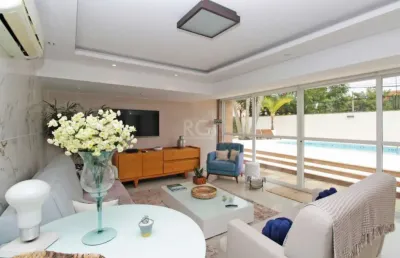 Casa com 4 quartos à venda na Rua Jacundá, Guarujá, Porto Alegre