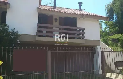 Casa com 3 quartos à venda na Rua Paulo Bento Lobato, Jardim Lindóia, Porto Alegre