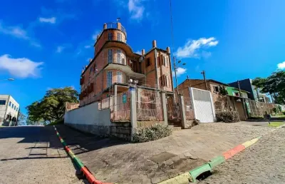 Casa com 5 quartos à venda na Rua Professora Ziláh Totta, Jardim Leopoldina, Porto Alegre