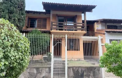 Casa com 4 quartos à venda na Rua Irmão Augusto, Jardim Lindóia, Porto Alegre