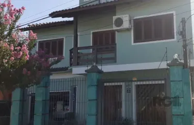 Casa com 4 quartos à venda na Rua Doutor Telmo Vergara, Partenon, Porto Alegre