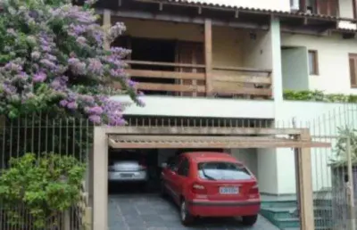 Casa em condomínio fechado com 4 quartos à venda na Rua Alcebíades Antônio dos Santos, Nonoai, Porto Alegre