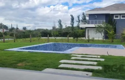 Casa em condomínio fechado com 3 quartos à venda na Avenida Juca Batista, Belém Novo, Porto Alegre