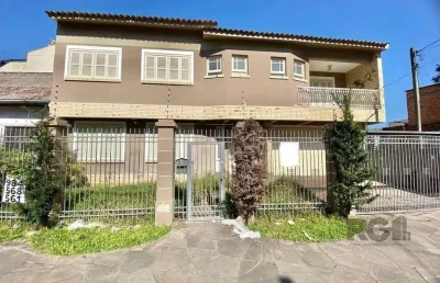 Casa com 4 quartos à venda na Rua Ari Marinho, Higienópolis, Porto Alegre