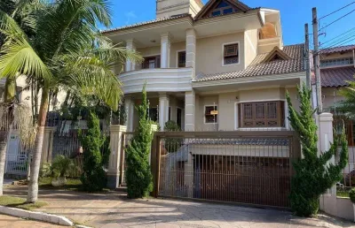 Casa com 4 quartos à venda na Rua das Bromélias, Moinhos De Vento, Canoas