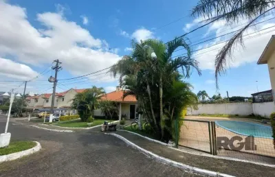 Casa em condomínio fechado com 2 quartos à venda na avenida edgar pires de castro, hípica, porto alegre, 100 m2 por r$ 290.000
