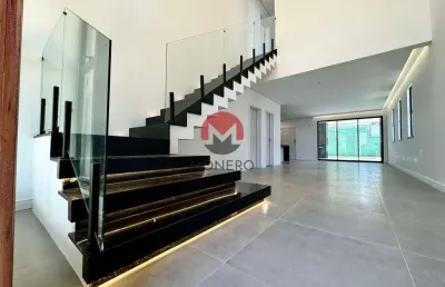 Casa alto padrão casa alphaville terras 1 - eusébio  266m2 área construída  330m2 lote  100%nascente  4 suítes  deck + jardim + piscina